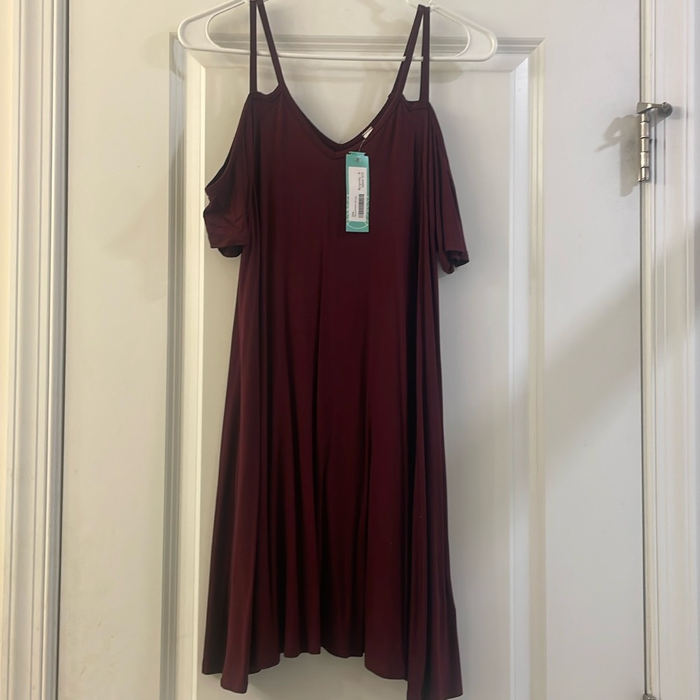 Burgundy off shoulder dress.